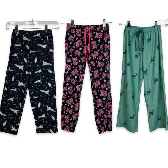 THREE GIRLS VARIOUS BRAND PAJAMA PANTS SKULL SPACE SHUTTLE DEER SIZES 7/8/M - Picture 1 of 14